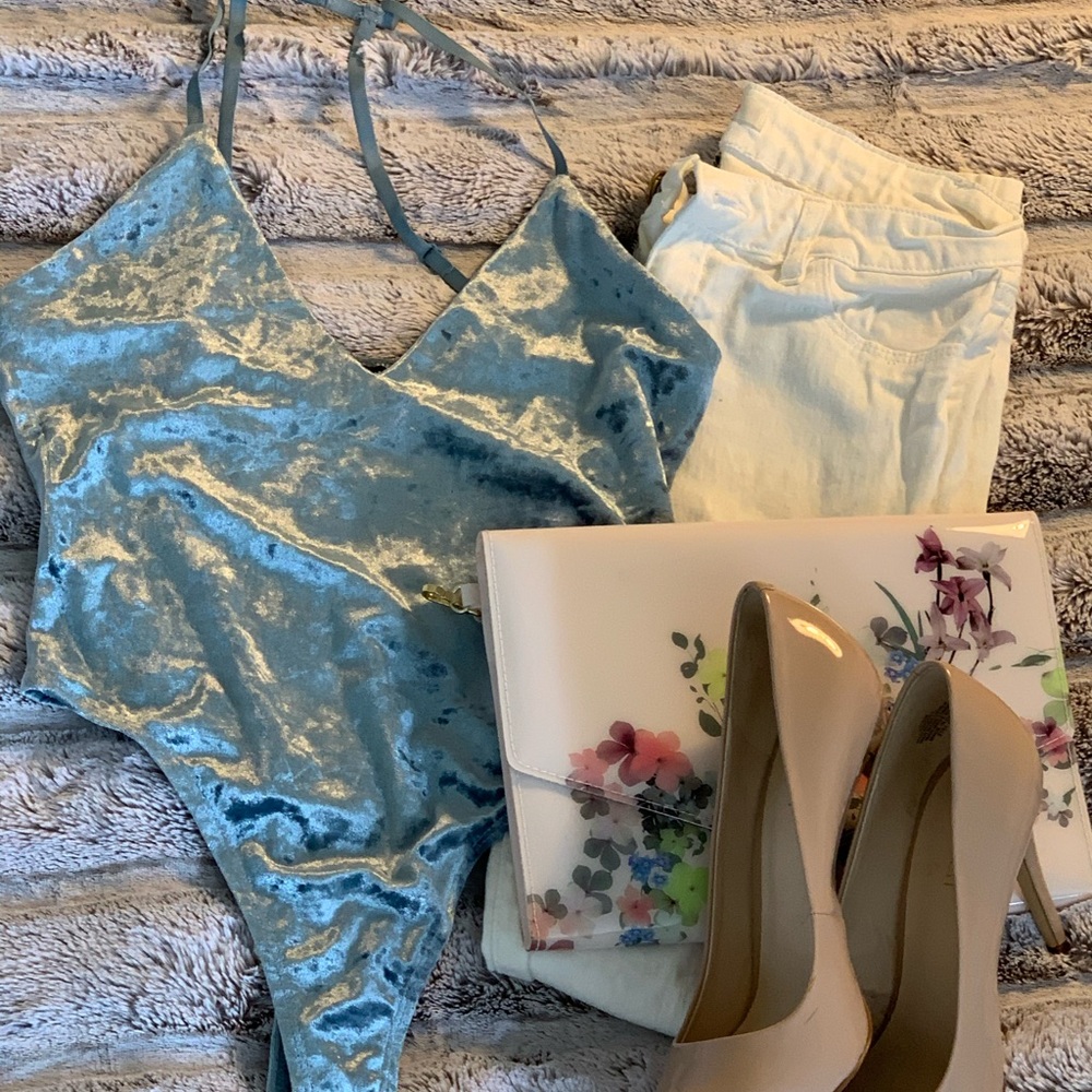 Super cute, side bodysuit. Never used.